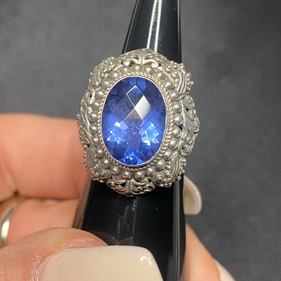 Blue Topaz and Sterling silver .925 ring. 
Size 6
Gorgeous detail. - Picture 4 of 9